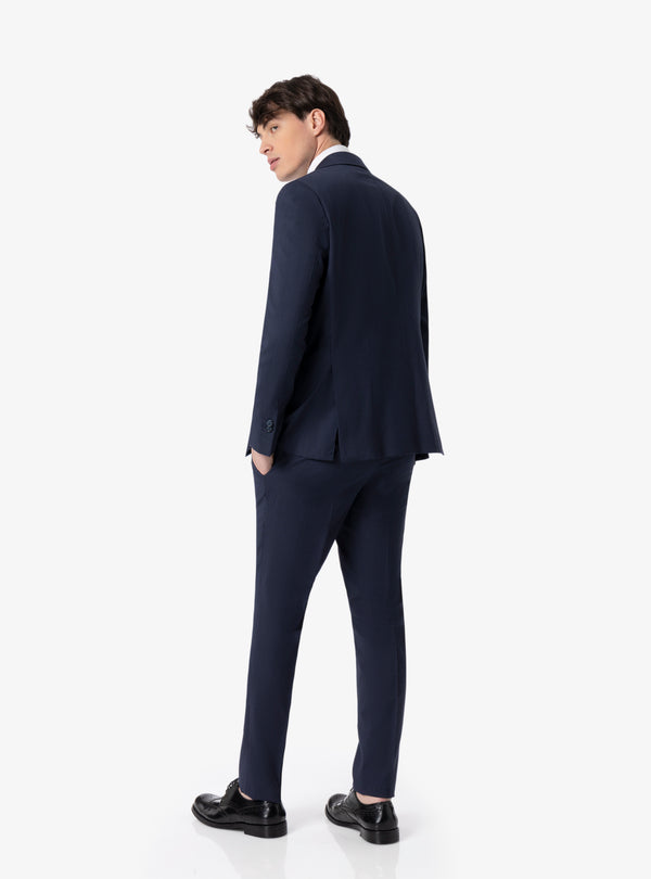 Elegant dress with skate pocket and trousers with aspect