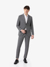 Elegant suit with flap pocket and cuffed trousers