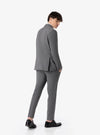 Elegant suit with flap pocket and cuffed trousers