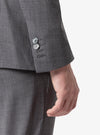 Elegant suit with flap pocket and cuffed trousers