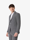 Elegant suit with flap pocket and cuffed trousers