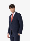 Elegant suit with flap pocket and cuffed trousers